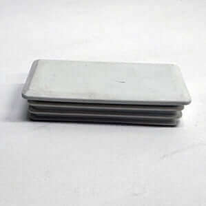 Plastic cap for workbench uprights