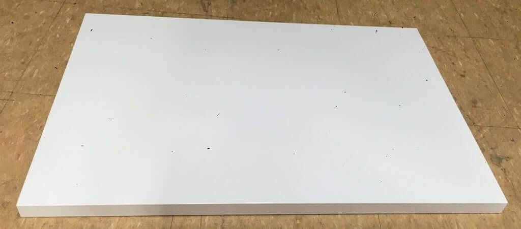 White rectangular extra deck panel for Falcon heavy duty long span shelving on wooden floor
